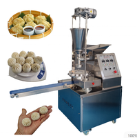 Machine de fabrication de produits céréaliers Machine automatique de fabrication de momo farci à la vapeur Machine à remplir les boulettes de soupe Dimsum Dim Sum Baozi