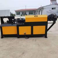 Machine de redressement et de coupe automatique à commande numérique pour barres d'acier