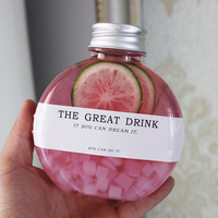 Bouteille créative ronde jetable de 300 ml en PET pour thé au lait et boissons, avec design sérigraphié et couvercle scellé