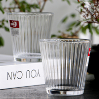 Tasse en verre à eau vente en gros de verrerie domestique tasse en relief clair jus tasse en verre à boire