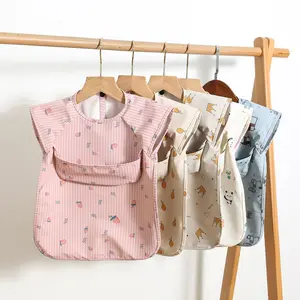 2023 NEW Sleeveless Toddler Children Feeding Smock Apron Bib Coverall Printed Waterproof PU Baby Bib with Pocket Catcher