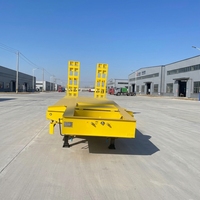 Semi-remorque à plateau surbaissé à trois essieux Dingtu, modèle populaire, avec châssis jaune en acier antichoc à ressorts, capacité de charge lourde 150T, personnalisable