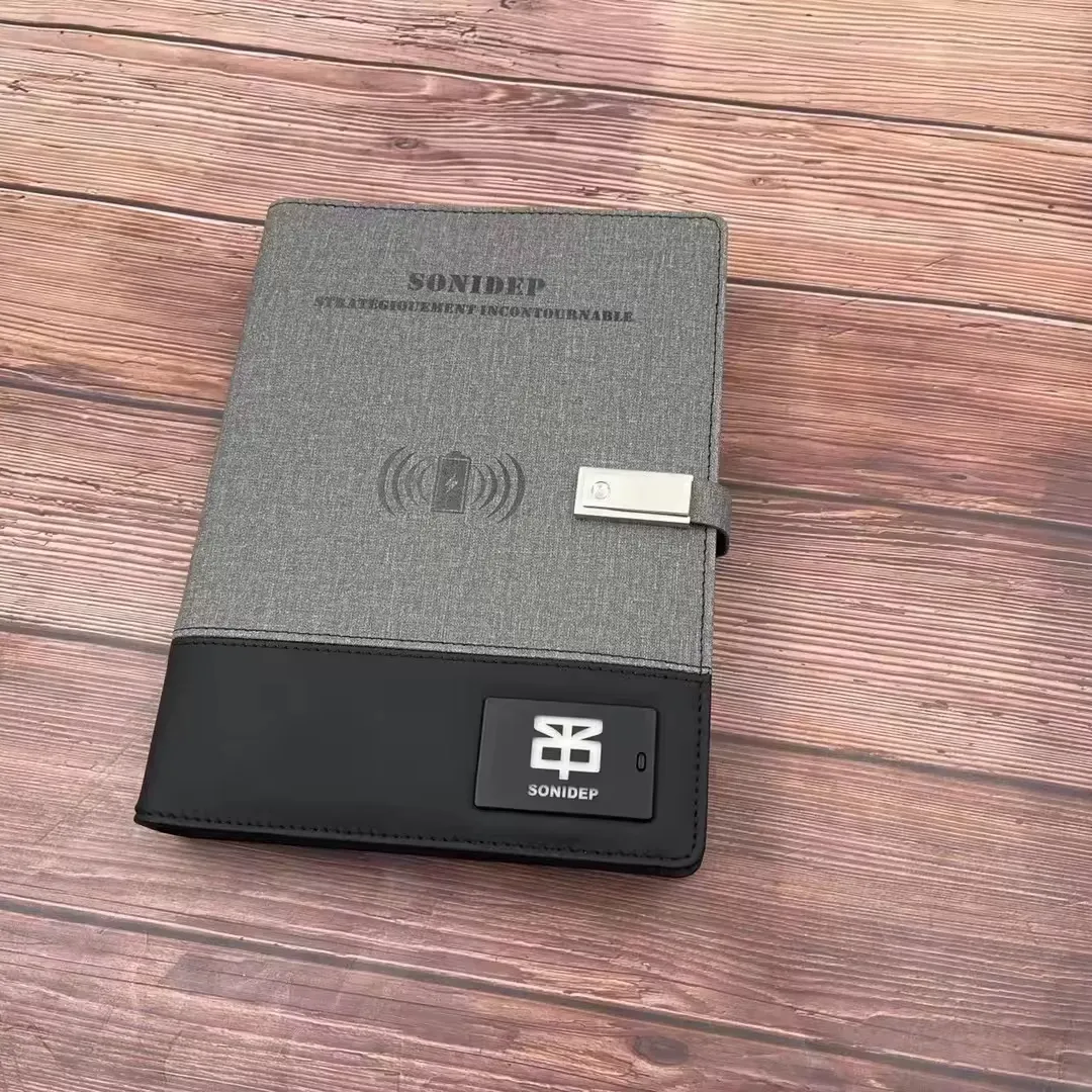Gran oferta cargador inalámbrico Notebook Popular Power Bank Notebook logo luz Unique Power Bank notebook con USB flash drive Lámpara