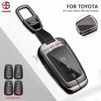 Coque de clé de voiture de luxe en alliage de zinc et fibre de carbone pour Toyota Corolla Hybrid 2025 Rav4 Camry Highlander Prius 2021 2023 2026
