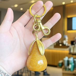 Wholesale Gilded Pear Keychain Elegant Green & Gold Pear Pendant with Triple <b>Leaves</b> Fashionable Bag Charm & Keyring Accessory - Product Image 5