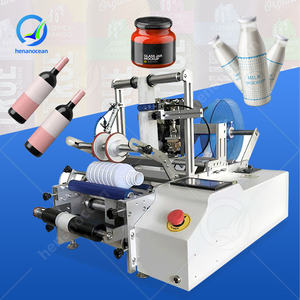 Machine d'étiquetage manuelle semi-automatique OCEAN pour rouleaux plats, étiquettes Bopp, boîtes, bidons, bouteilles et impression numérique - Product Image 1