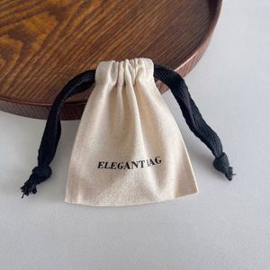 Wholesale Eco-Friendly Jewelry Packaging <b>Pouch</b> Small Cotton Fabric Gift <b>Drawstring</b> <b>Pouch</b> Bag With Black Ribbons - Product Image 1