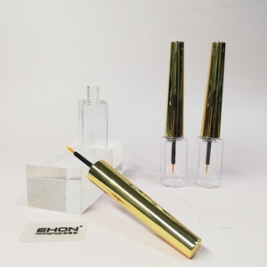 Tube d'eye-liner doré métallisé avec capuchon, conteneur en plastique personnalisé pour eye-liner liquide, flacon cosmétique transparent vide pour cils, emballage - Product Image 1