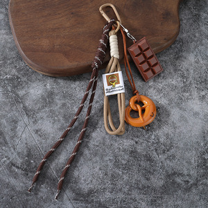 Nouveau porte-clés pendentif pain mignon Miu, eau alcaline, pour étudiants et couples, décoration de sac à dos en PVC, style automne-hiver - Product Image 5