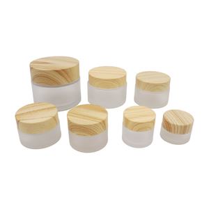 Customized LOGO 30g 50ml 100ml Empty <b>Bamboo</b> Lid Amber Clear Frosted Face Body Cream Cosmetic Glass Cream <b>Jar</b> - Product Image 3