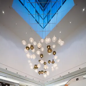 北欧现代摩洛哥风格酒店大堂楼梯装饰带大型悬挂烟灰色玻璃发光二极管吊灯