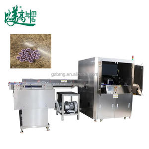 Máquina Automática de Alimentación y Marcado Láser UV para Tapas de Botellas de Leche con Sistema de Recolección de Datos y Rechazo - Product Image 1