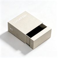 Boîte cadeau en carton ondulé écologique avec poignée, matériaux recyclés, finition mate et gaufrée pour bijoux
