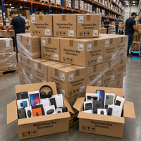 Pallets mystères en gros d'électronique avec caméra pour bébé, horloges de table intelligentes, smartphones et ensemble de gadgets aléatoires pour la vente en ligne