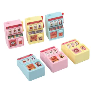Juguete promocional suerte dibujar dulces máquina tragaperras cápsula juguetes mini plástico novedad lotería rueda juguete para niños