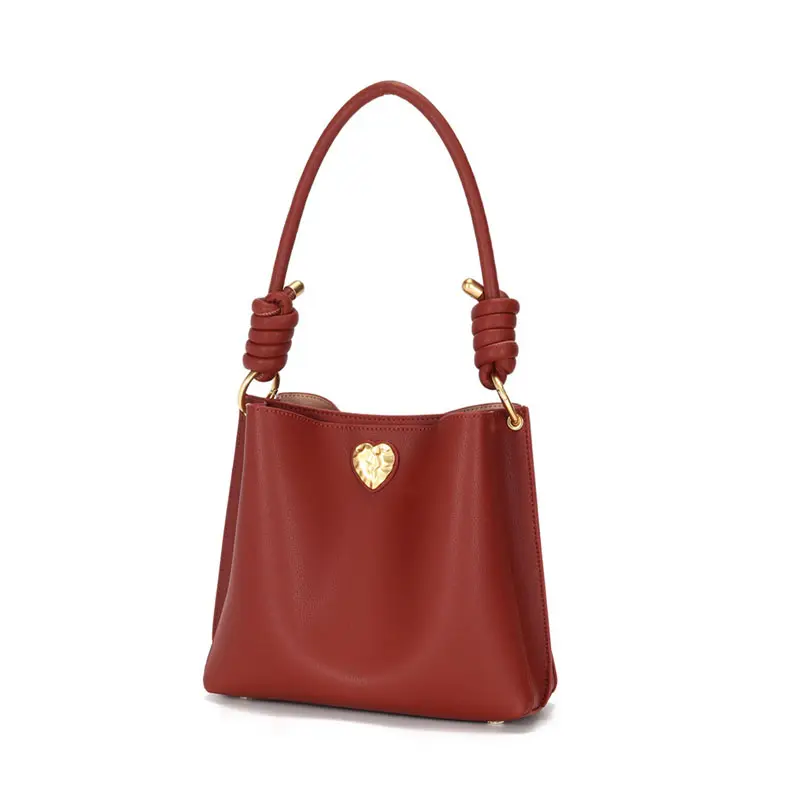 Kadınlar büyük Tote çanta omuz çantası moda bayanlar çantalar Satchel postacı çantası kalp hakiki deri şeker özel LOGO