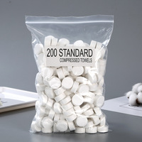 Portable 100% Viscose 50GSM Nonwoven Outdoor Travel Towels Disposable Mini Compressed Towel 100/200/500 Pieces/Poly Bag Soft