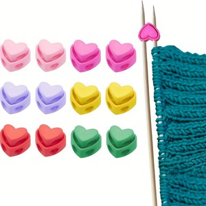5 unidades/bolsa Tapas de aguja de plástico con diseño de corazón, de doble orificio y <span class=keywords><strong>resorte</strong></span>, ecológicas, duraderas y coloridas para tejer - Product Image 1