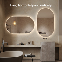 Miroir intelligent anti-buée moderne avec LED, IP44, forme ovale personnalisée, éclairage LED à intensité variable, miroirs de salle de bain pour hôtel