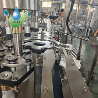 Machine d'étiquetage de film BOPP de type rotatif, machine d'étiquetage automatique à colle thermofusible OPP pour bouteilles d'eau rondes en PET, haute vitesse