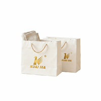 Impression de logo personnalisé en or KM pour les sacs en papier d'emballage pour les achats avec marquage personnalisé OEM ODM en gros