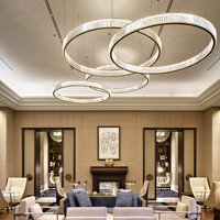 Fournisseur professionnel de luminaires suspendus optiques LED modernes de luxe, sur mesure, en verre, pour villas et salons.