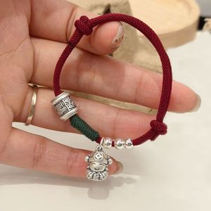 Pulsera de plata pura con dije de dibujos animados del Dios de la Fortuna y cuerda roja para uso diario de mujer - Product Image 1