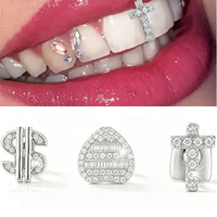 Bestseller transfrontalier : Ensemble de trois pièces de protège-dents hip-hop en cuivre incrusté de zircon, avec motifs croix, dollar et cœur