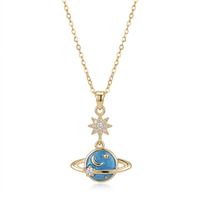 Collier en acier inoxydable plaqué or 18 carats avec pendentif planète Saturne, breloque étoile en zircone, chaîne à maillons inspirée de la galaxie pour femme