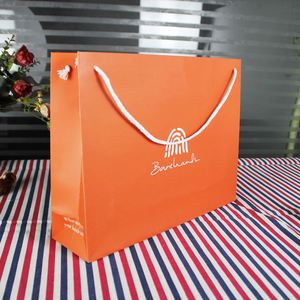 Custom Luxury Recycled Paper Cardboard Luxury Paper Packaging Gift Bag for Clothes Shopping Bags - Product Image 1