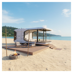 Maisons préfabriquées de conception OEM ODM personnalisables Villas portables de luxe Capsule intelligente pour la plage le camping la montagne enneigée - Product Image 1