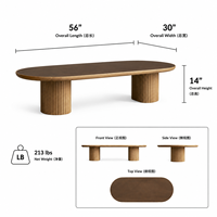 Table basse ovale avec plateau en marbre, bord en bois, base en piédestal cannelé pour salon