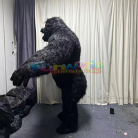 Costume de mascotte de gorille polaire à fourrure gonflable pour décorations de carnaval et publicité comprenant un accessoire de ventilateur