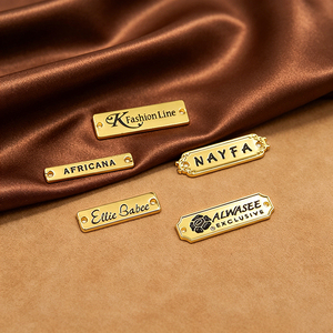 Custom Metal Garment Labels Rectangle Shape Gravure Printing Embossing Stitch Main Labels for Clothing - Product Image 1