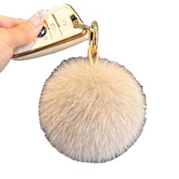 Pendentif de sac en vraie fourrure de renard fait main, porte-clés de voiture en peluche populaire, décoration mignonne, accessoire de sac à dos pour couples