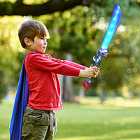 Neonglo Jouet pour enfants Épée de dinosaure LED lumineuse, Nouveauté pour le cosplay, Cadeau de Nouvel An et d'anniversaire, Accessoire coloré pour jeu de rôle et fête costumée