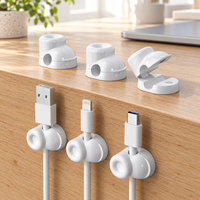 Clip magnétique pour câble avec fermeture à clapet et base adhésive pour l'organisation des câbles de charge sur le bureau, le chevet et le rangement à domicile/bureau