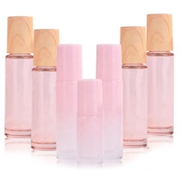 Flacon de stockage en verre givré rose rechargeable de 10 ml, 30 ml, 50 ml, 60 ml pour parfum, tonique, huile essentielle, gouttes pour les yeux, avec bouchon en bois