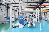 Centre d'usinage CNC à portique robuste PTP avec lame de scie pour la production de meubles et d'armoires