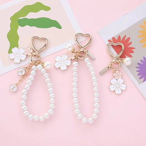 Wholesale Sweet Cherry Blossoms Key Chain Pearl <b>Letter</b> Pendant Car Ring for Women Headphone Case Charms Bag Decor Jewelry Gift - Product Image 4