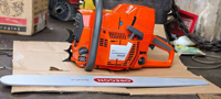 Tronçonneuse à essence professionnelle de 5,2 kW, modèle Husqvarna 395XP, 93,6 cm³, guide-chaîne de 24 pouces, robuste, pour l'abattage et la coupe d'arbres.