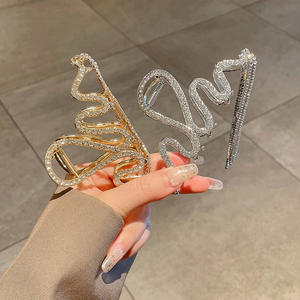 Holesale-diamantes de imitación coreanos, garra de pelo dorado de cristal con cadena de borla, clip de garra de cristal de metal - Product Image 6