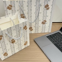 Sac cadeau en papier kraft brun biodégradable et écologique personnalisable, impression couleur, logo en relief, logo privé pour chaussures