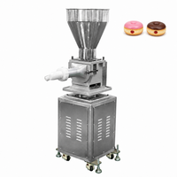 Machine automatique professionnelle pour l'injection de garnitures (crème, confiture, chocolat, pâte à gâteau, pain, beignets, crème anglaise) pour pâtisseries et boulangeries