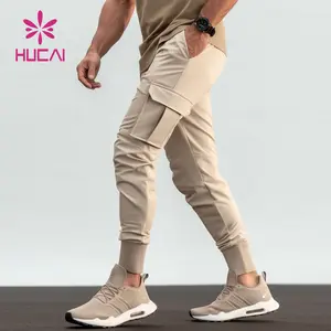 Hucai Custom Hoge Kwaliteit Sport Actieve Kleding Zakken Fitness Slim Fit Nylon Skinny Gym Joggers Voor Mannen