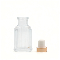 Bouteille diffuseur d'arômes en verre transparent rond vide de 50 ml avec logo personnalisé pour salle de bain