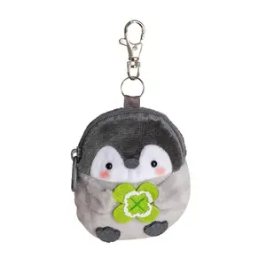 Mignon et créatif trèfle à quatre feuilles petit pingouin en peluche mini porte-monnaie casque sac de rangement pendentif porte-clés mignon