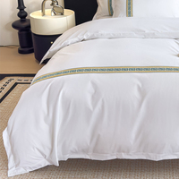 Parure de lit 4 pièces en coton 100% brodé blanc pur, style simple, pour hôtel 5 étoiles et gîte, comprenant housse de couette et drap.