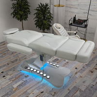 Table de massage électrique de luxe moderne et réglable pour spa facial, 4 moteurs, éponge haute densité, cuir PU, métal, pour salon et hôtel