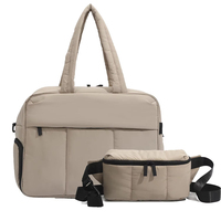 Ensemble de voyage haut de gamme matelassé, sac à main en nylon élégant, sac de week-end sophistiqué multi-poches avec compartiment à chaussures ODM